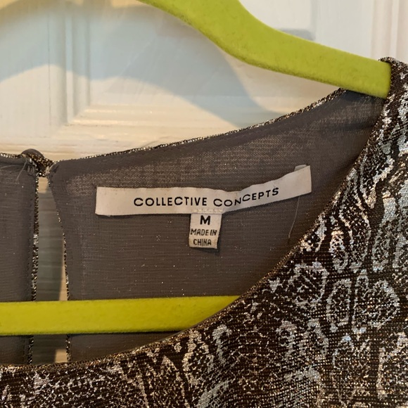 Collective Concepts shiny animal print blouse. Size Medium. - Picture 2 of 4